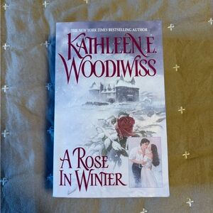 A Rose in Winter by Kathleen E. Woodiwiss - Paperback Like New Condition